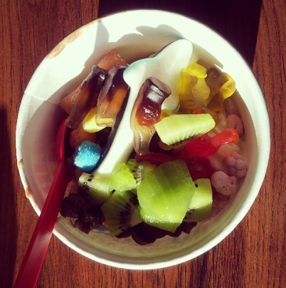 Celebrating with a bucket of sweets, there is yogurt somewhere in the bottom.